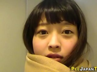 Amateur Japanese teen shows off her wet pussy